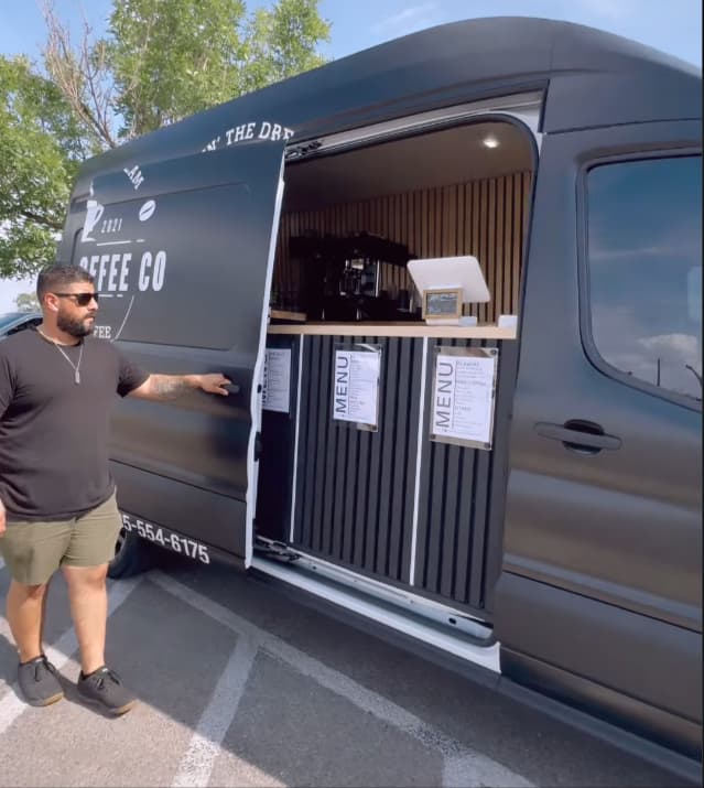 A mobile food van set up for service